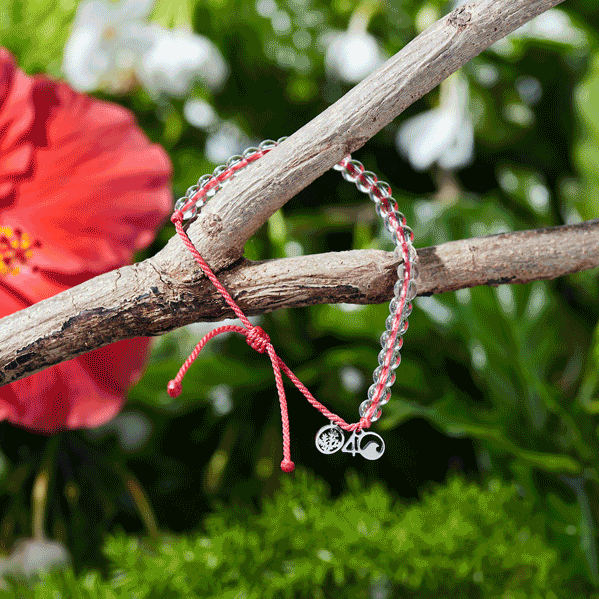 Colorful bracelets by 4Ocean, made from recycled glass and plastic