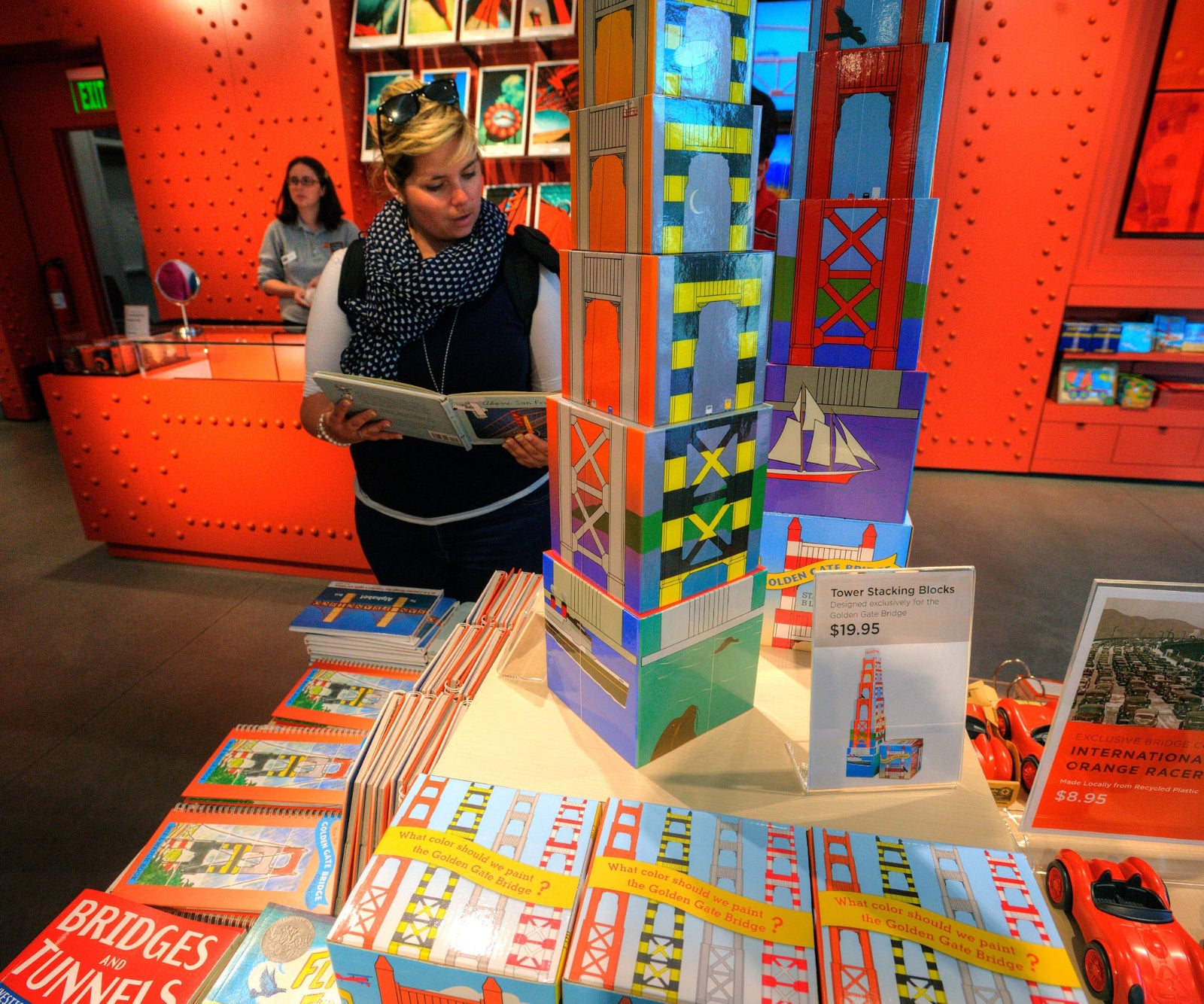 Woman shopping in Golden Gate Bridge Welcome Center store gift shop