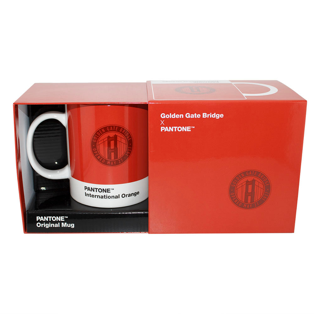Red and white mug in a branded box with 'Pantone' and 'Golden Gate Bridge' logos.