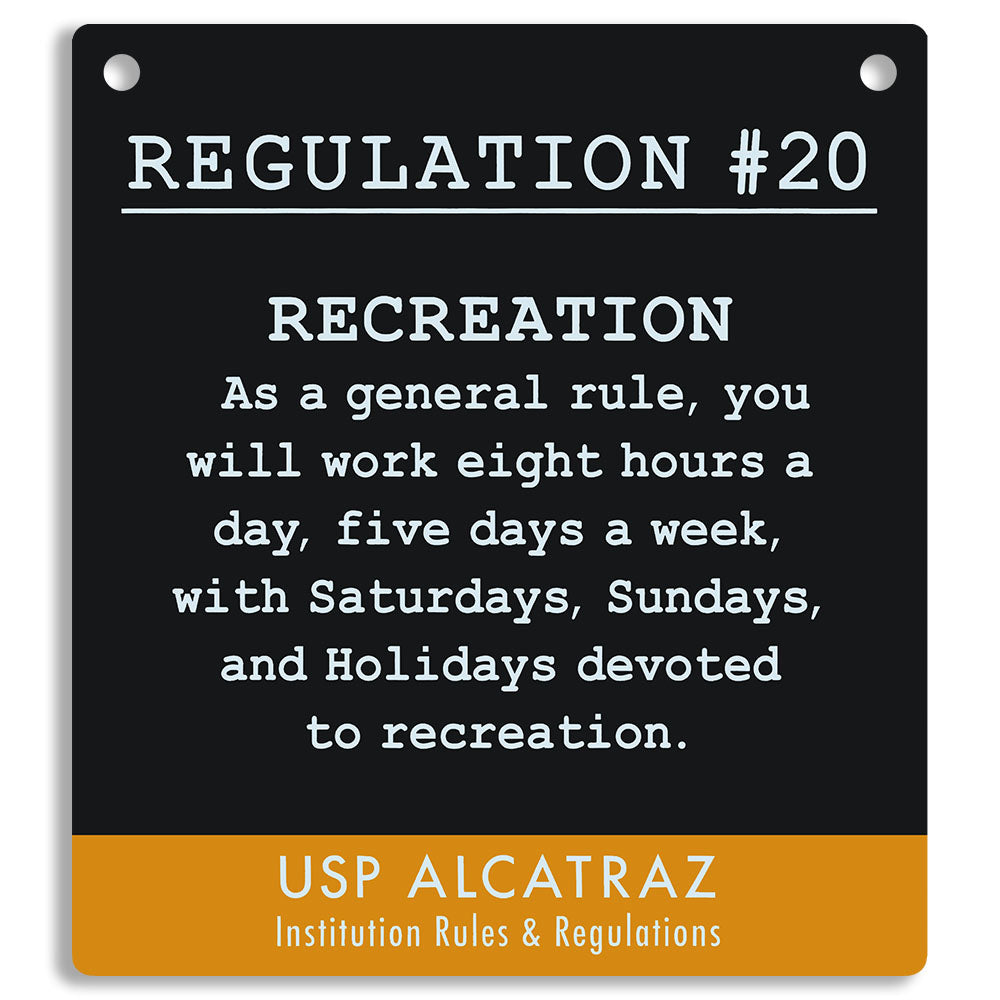 Sign with text about rules and regulations at USP Alcatraz on a black and orange background. "As a general rule, you will work eight hours a day, five days a week, with Saturdays, Sundays, and Holidays devoted to recreation."