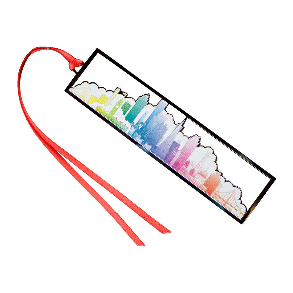 Rainbow colored San Francisco skyline cutout metal bookmark in packaging with blue and white design