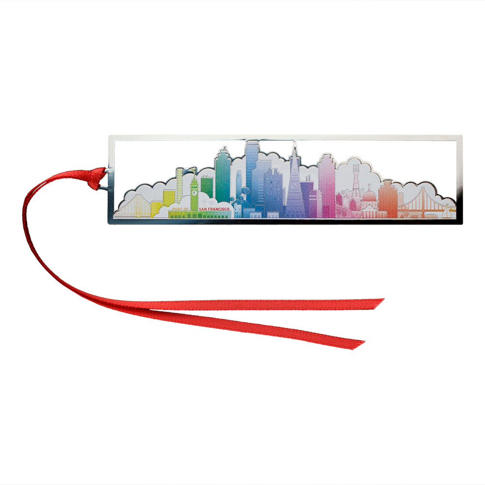 Rainbow colored San Francisco skyline cutout metal bookmark in packaging with blue and white design