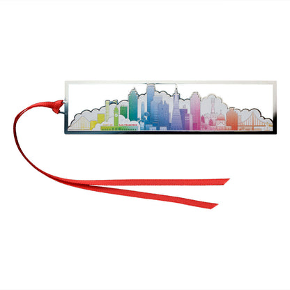 Rainbow colored San Francisco skyline cutout metal bookmark in packaging with blue and white design