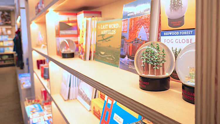 Shelves with books and decorative items at the Warming Hut Bookstore in San Francisco