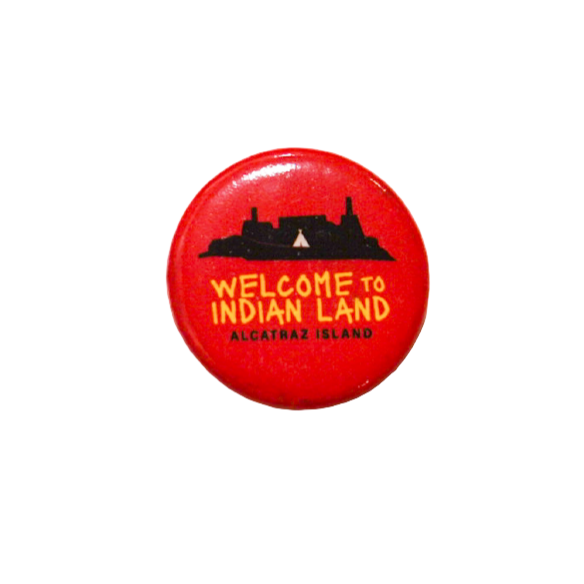 Red button with 'Welcome to Indian Land Alcatraz Island' text on a white background