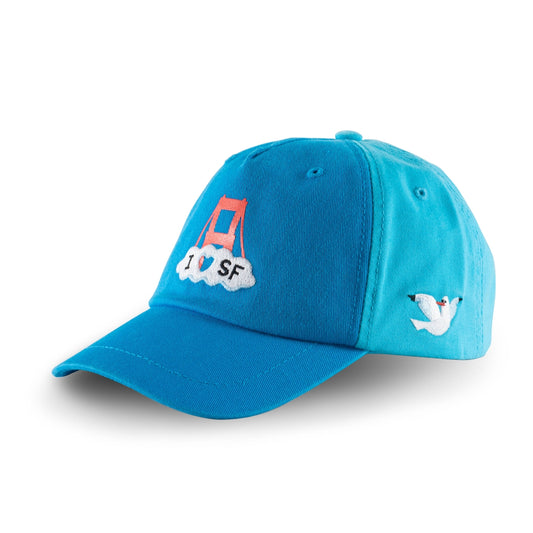 Light blue kids baseball cap with screen-printed and embroidered I Heart San Francisco and Golden Gate Bridge design details.